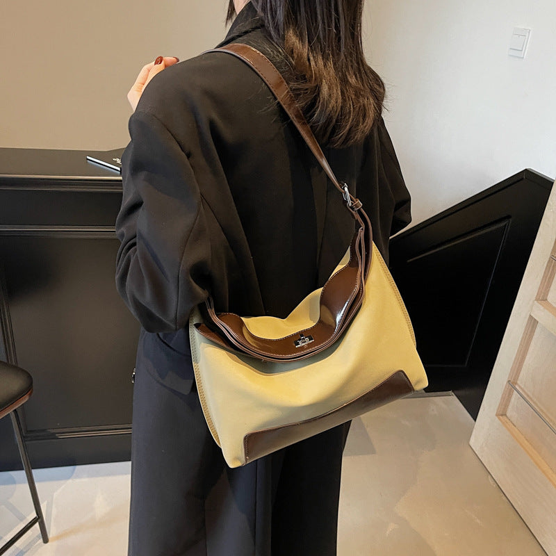 Cross-border design contrasting color splicing canvas bag women's 2025 new fashion trend shoulder messenger women's bag tote bag