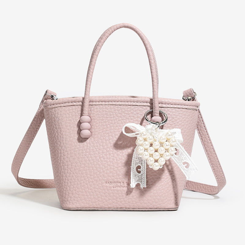 High sense fashion simple portable bucket bag women's 2025 spring and summer new casual simple solid color shoulder messenger bag