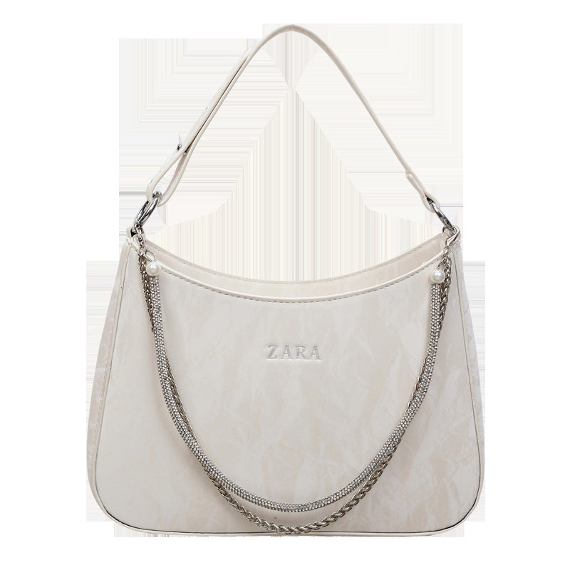 High-end women's bag, large capacity, 2025 new style, niche design, shoulder bag, crossbody bag, understated luxury, textured, commuter tote bag