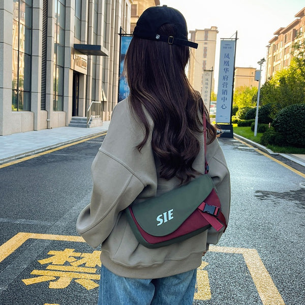 Hong Kong style casual satchel 2024 new fashion letter contrasting color sports outdoor messenger bag large capacity shoulder bag men