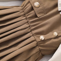 Girls' dress for toddlers and young children, featuring a patchwork collar, cinched waist, long sleeves, and pleated skirt