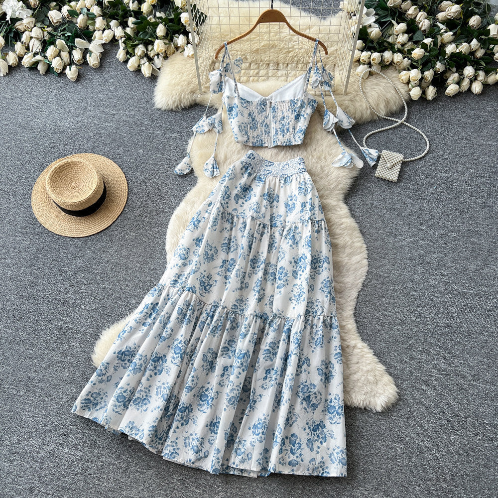 Vacation-ready blue floral two-piece set: women's summer high-waisted maxi skirt outfit - perfect for a garden getaway