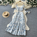 Vacation-ready blue floral two-piece set: women's summer high-waisted maxi skirt outfit - perfect for a garden getaway