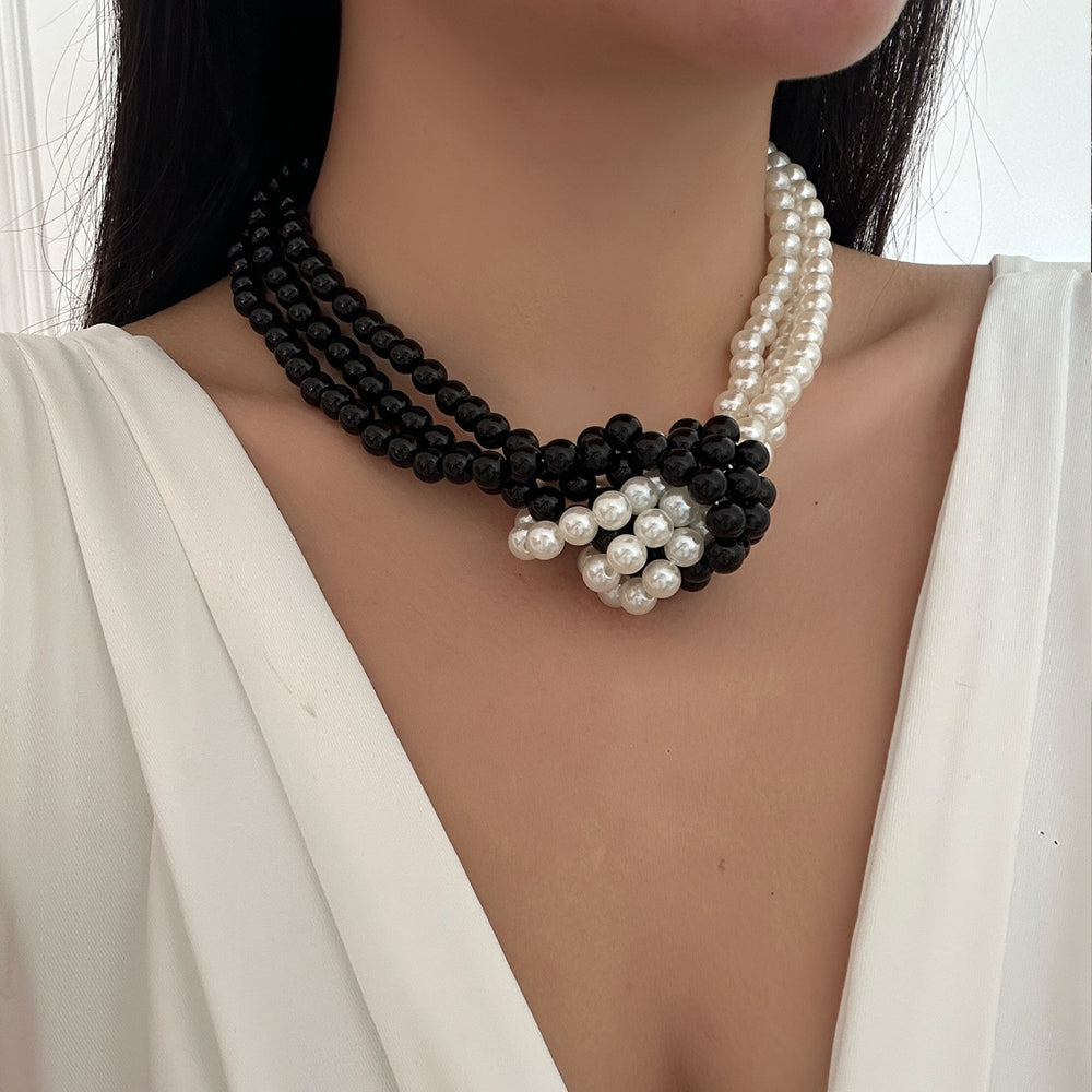 Multi-layered imitation pearl necklace wholesale, european and american fashion, artistic retro black and white color block jewelry, high-end women's choker