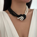 Multi-layered imitation pearl necklace wholesale, european and american fashion, artistic retro black and white color block jewelry, high-end women's choker