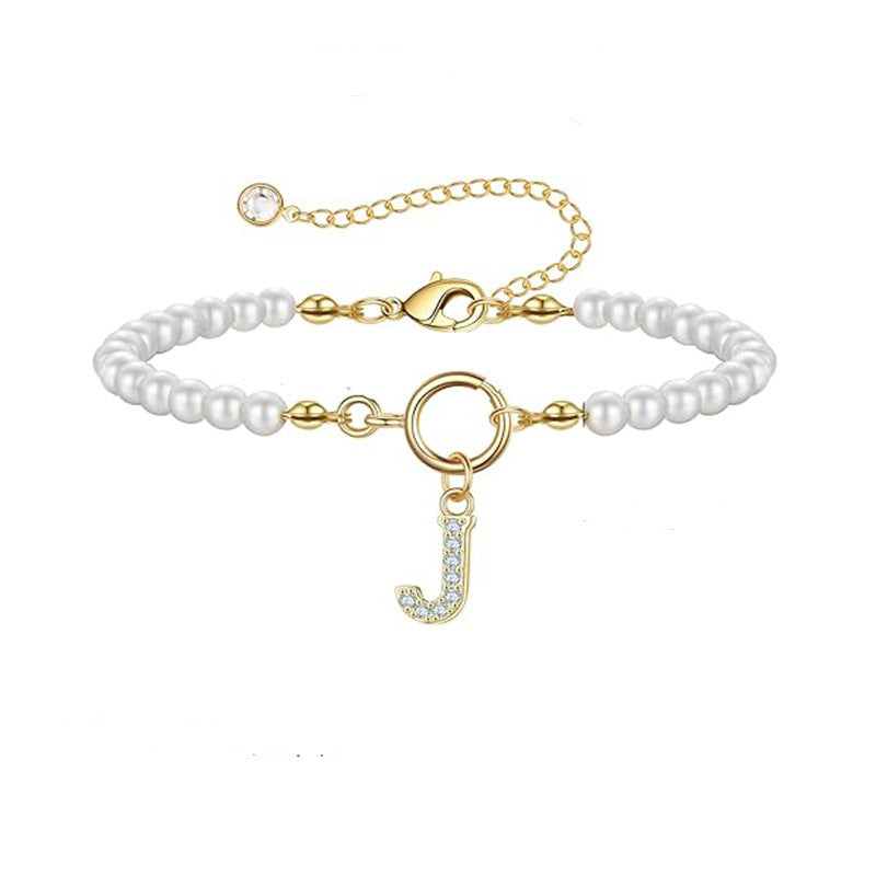 European and american cross-border faux pearl bracelet with 26 english alphabet pendant design - minimalist chic handmade beaded jewelry