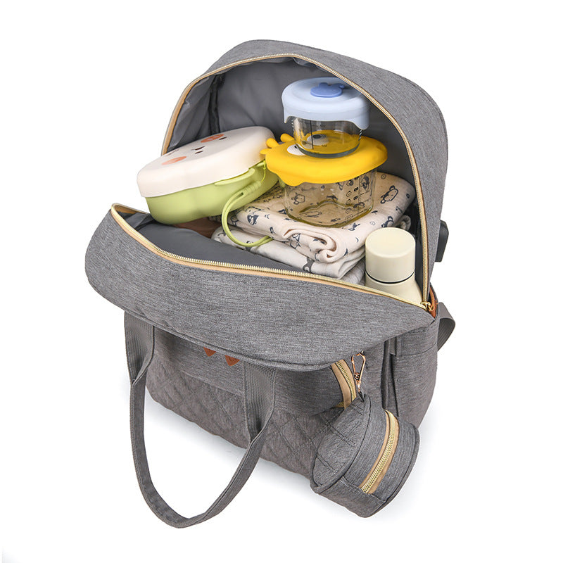 Cross-border customized large-capacity mommy bag, multi-functional mother and baby bag, thermal insulation bottle warehouse, casual outdoor backpack.