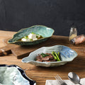 Japanese kiln-turned ceramic flavor dish stylish restaurant hotel oyster-shaped high-value dessert small dish dipping soy sauce dish