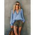 Shipped: new european and american style women's v-neck ruffle trim solid color long sleeve versatile blouse