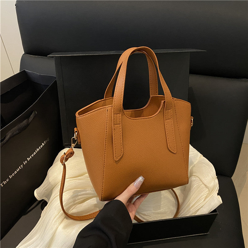 Simple and versatile portable bucket bag women's Korean version ins fashionable and simple shoulder bag 2025 new casual messenger bag