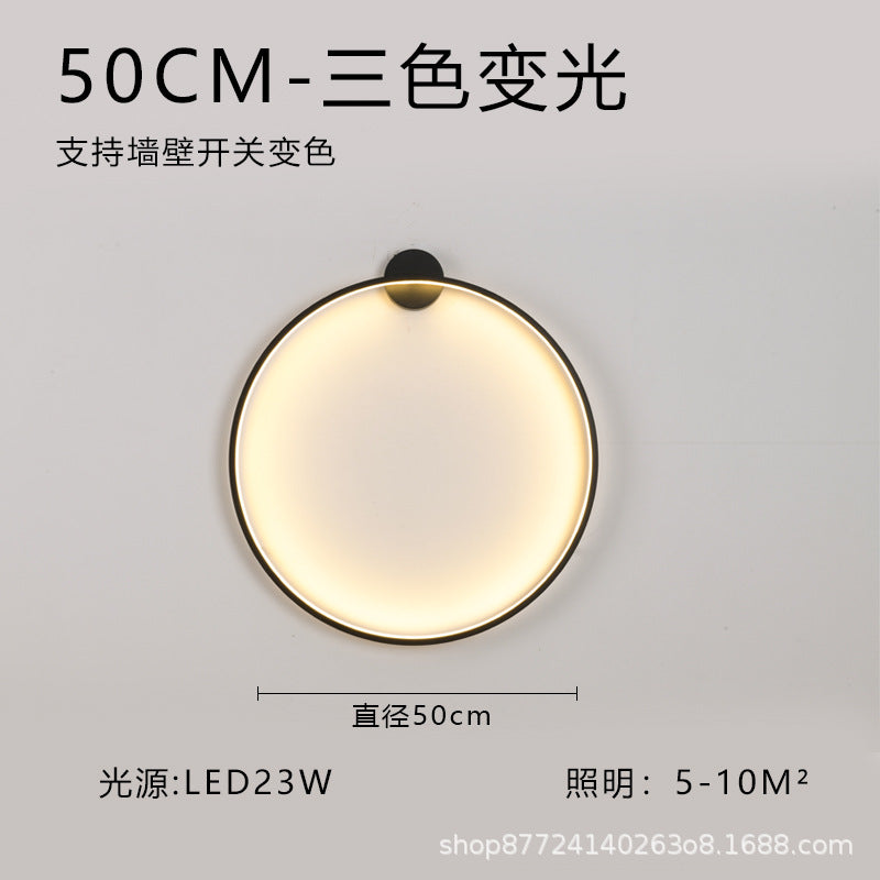 Minimalist chic large round wall sconce - stylish ambient lighting for living room backdrops, bedroom headboards, and more