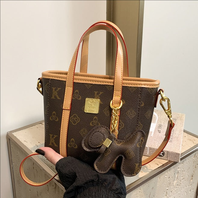 Cross-border high-end printing fashion portable bucket bag women's 2025 new versatile foreign trend shoulder messenger bag