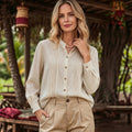 European and american lazy style off-white stand collar shirt with pleated design, button-down long sleeves, and a relaxed fit