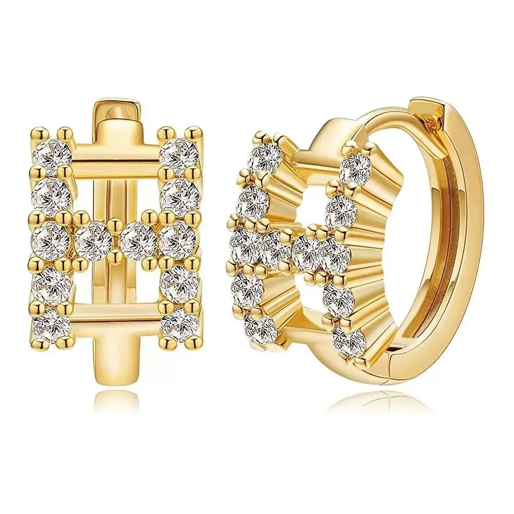 European and american jewelry: ear cuffs, diamond-studded small hoop earrings, stud earrings, and ear bone rings