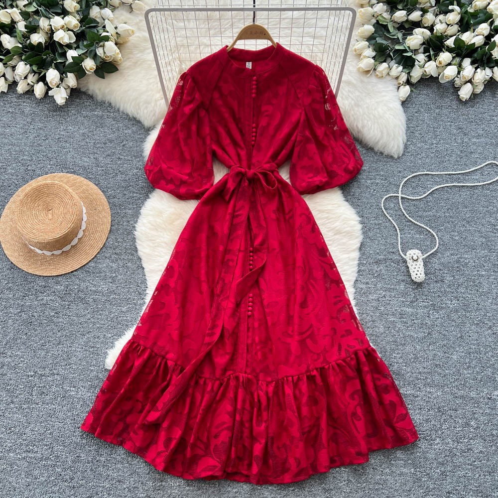 French-inspired v-neck floral chiffon dress with flared sleeves, tie waist, and a figure-flattering, vintage-inspired silhouette