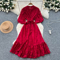 French-inspired v-neck floral chiffon dress with flared sleeves, tie waist, and a figure-flattering, vintage-inspired silhouette