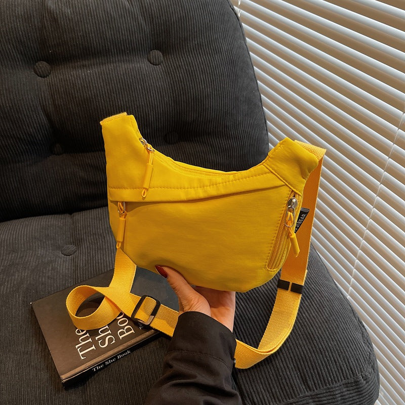 Foreign trade casual dumpling bag women's new lightweight messenger bag outdoor sports shoulder bag versatile commuter mobile phone bag
