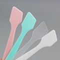 Wholesale factory for cosmetic tools: cream dispensing spatulas, mask applicators, mixing brushes, scrapers, spoons, and small cosmetic scrapers