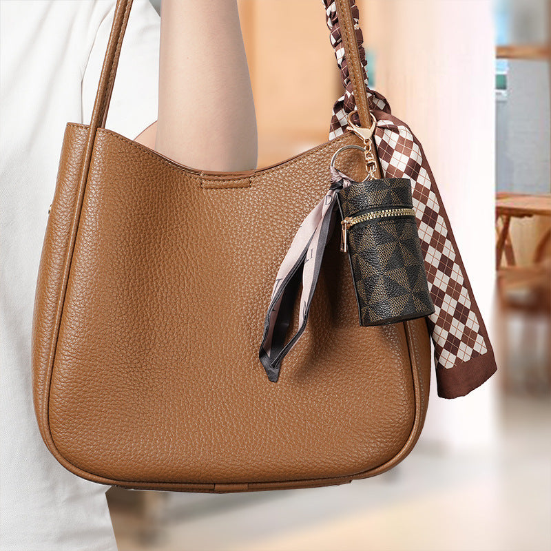 European and American old flower change bag 2024 new compact bag pendant earphone bag mouth red envelope mini keychain bag