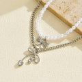 Sweater chain long wholesale european and american cross-border autumn and winter bow pendant stacking simple accessible luxury niche pearl necklace