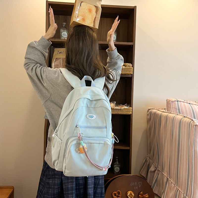 New personalized pain layer dual-purpose schoolbag large-capacity solid color removable pain bag primary school students middle school students backpack