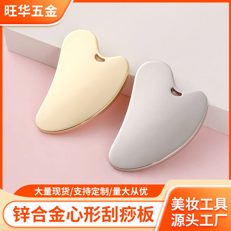 Custom zinc alloy scraping tool - heart-shaped, perforated metal fascia blade for massage and gua sha beauty treatment