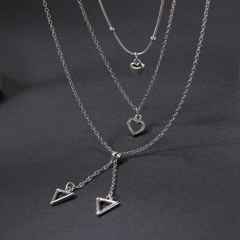 Silver love necklace wholesale new cross-border jewelry niche accessible luxury geometric diamond pendant women's multi-layered sweater chain