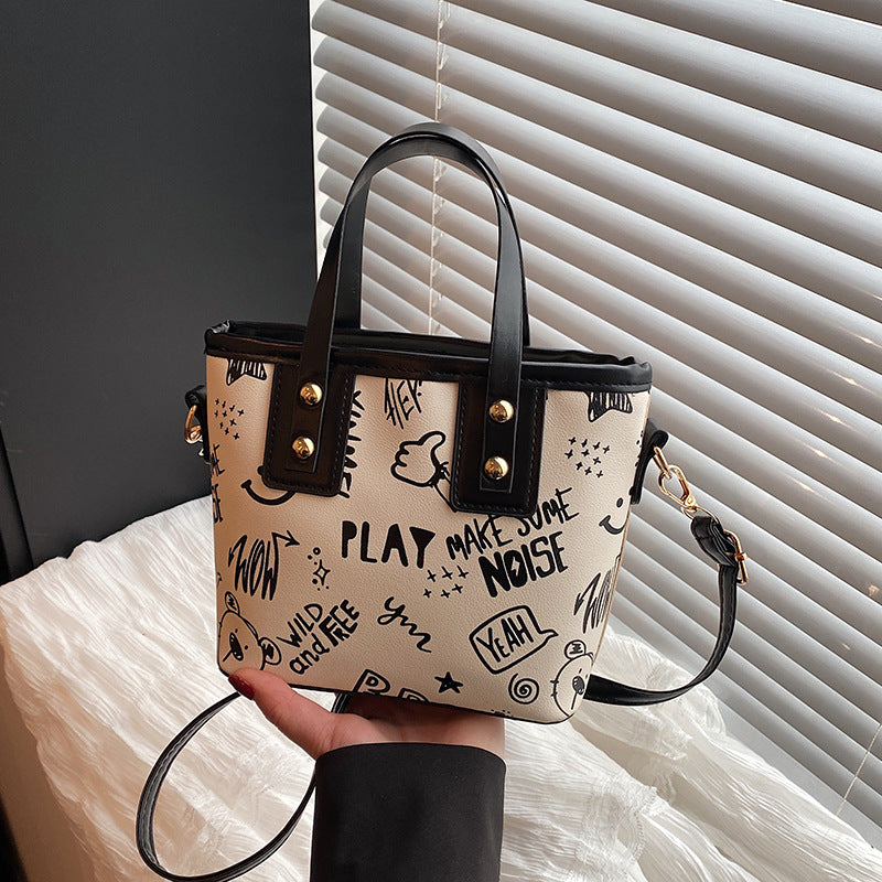 Cute cartoon printed bucket bag women 2025 new messenger bag women ins personality graffiti shoulder bucket bag