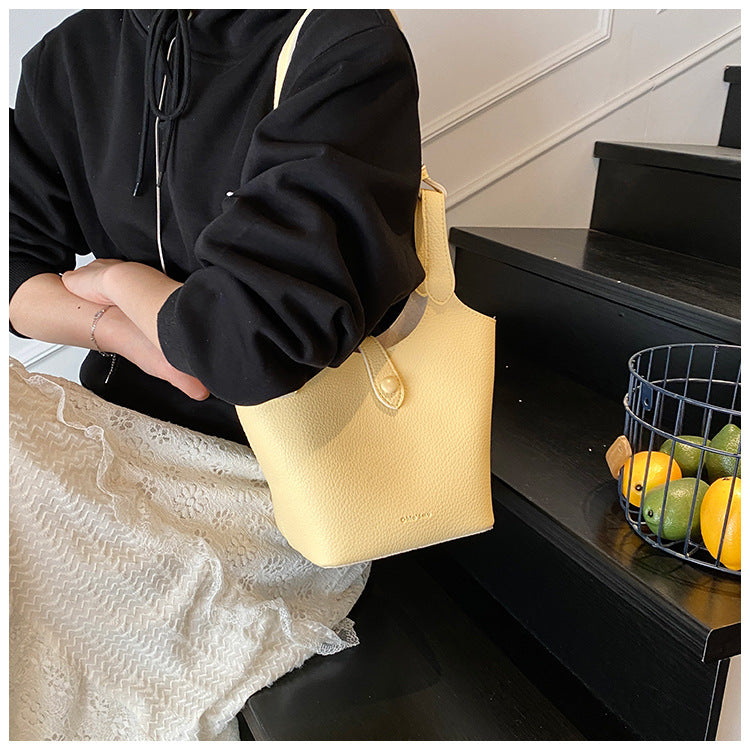Cross-border clear sky walk goose yellow bucket bag female 2025 super fire spring and summer portable messenger bag factory delivery