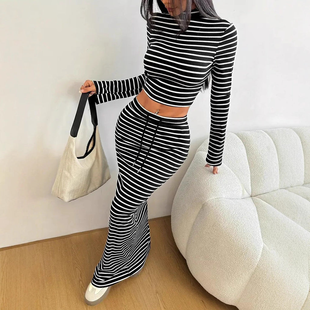 Cross-border European and American women's clothing solid color fashion striped suit semi-turtleneck long-sleeved top drawstring waist long skirt two-piece set
