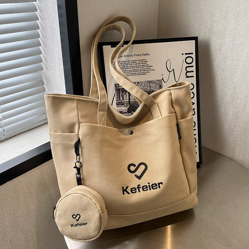 Canvas bag, women's large-capacity 2023 new high-end shoulder bag, college student class versatile commuter tote bag