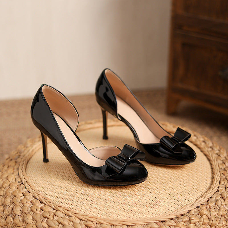2025 new nude thong heel pumps: elegant, comfortable, and chic. featuring a stiletto heel, round toe, and a stylish patent leather bow detail