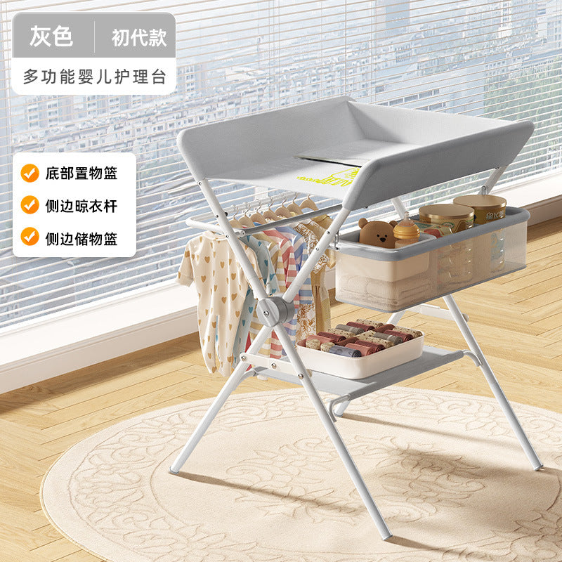 Baby changing table - newborn diaper changing, bathing, and massage station - foldable multifunctional baby bed