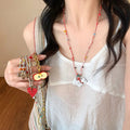 Cute puppy pendant necklace, perfect for summer. a colorful dopamine necklace, long enough to wear with hoodies or as a skirt accessory