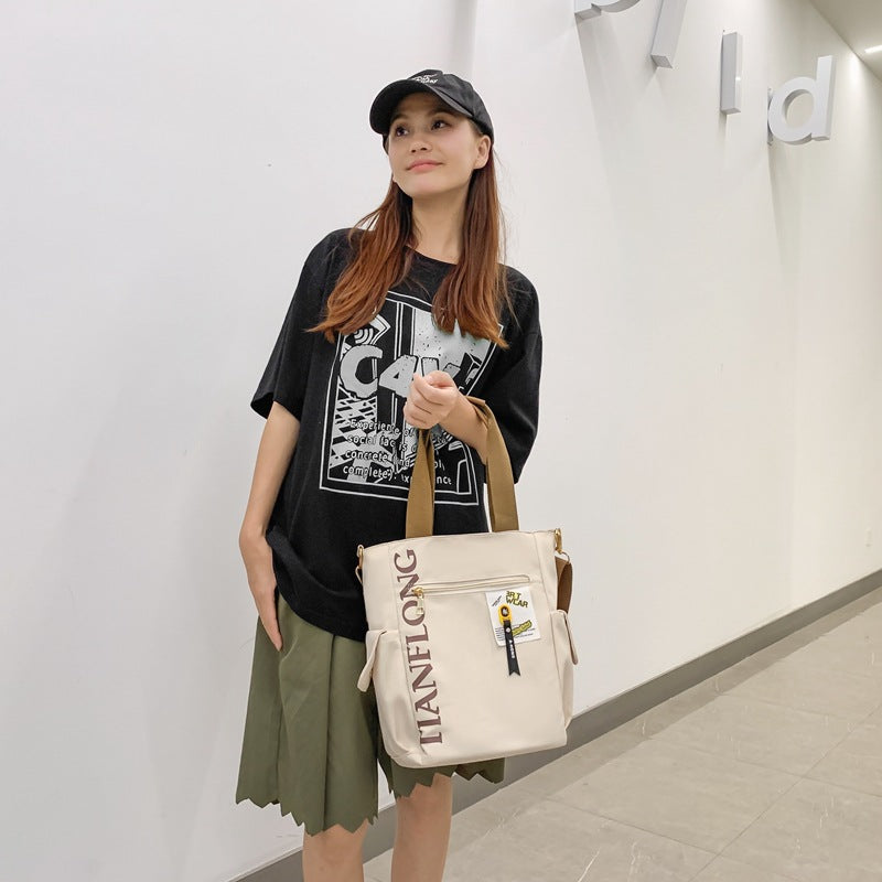 New Japanese large-capacity bag, casual and versatile women's shoulder bag, student class commuting messenger handbag