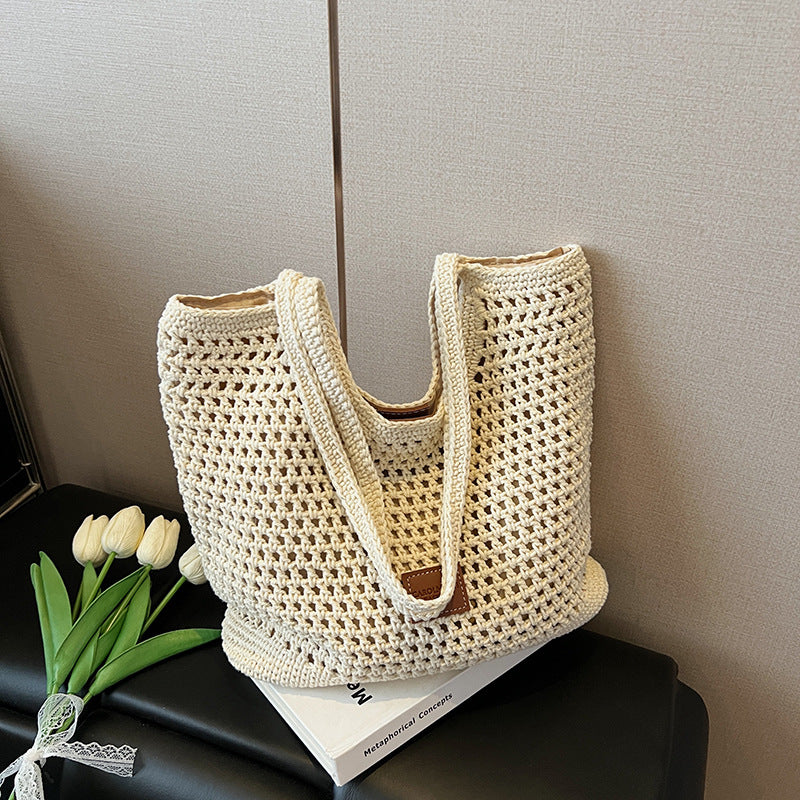 Cross-border commuting large-capacity hollow woven bag women's 2025 new versatile shoulder bag casual knitted tote bag