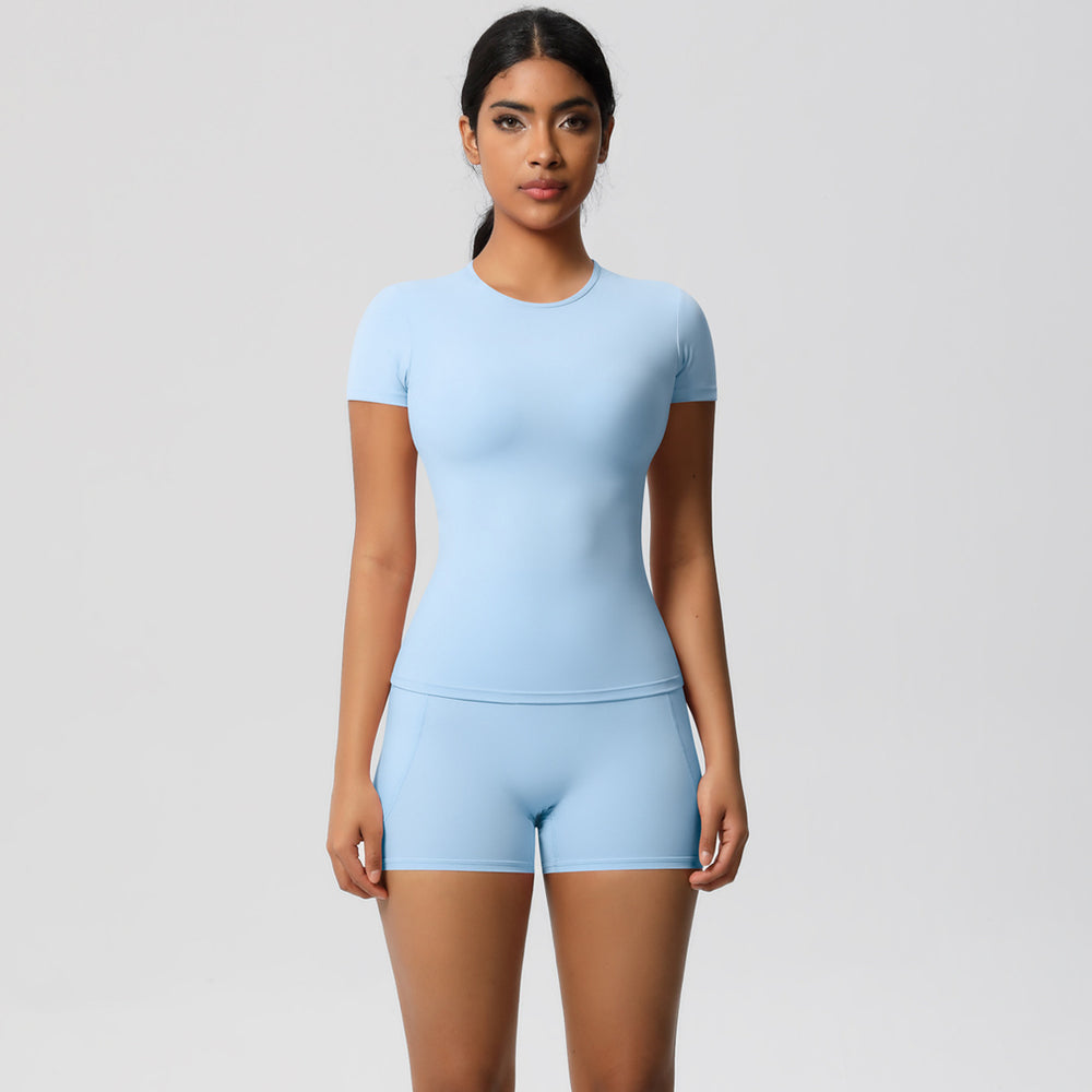 European and american style fleece-lined quick-dry short-sleeve yoga set with pocketed shorts for outdoor running and fitness
