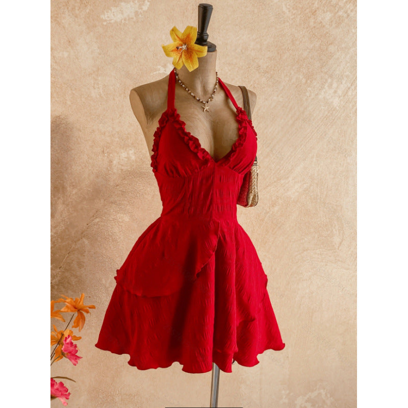 Women's summer fashion casual solid color halter backless asymmetrical hem mini dress (waist chain not included)