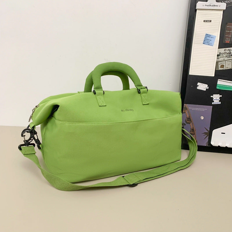 Foreign trade foldable duffel bag bag dry and wet separation messenger bag simple wear-resistant anti-splashing light short-distance bag wholesale