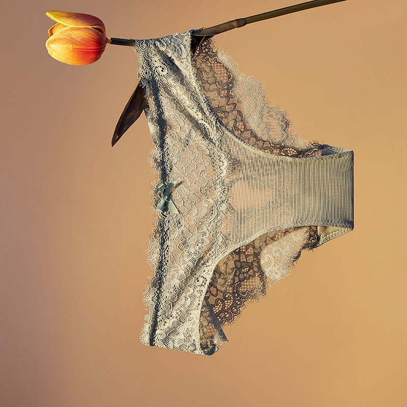 lingerie factory: low-rise, sexy women's panties featuring bow accents, lace detailing, and a breathable, criss-cross design. women's briefs