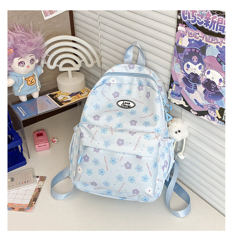 Niche original floral design schoolbag high value large capacity lightweight versatile backpack travel attendance backpack