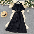 French-style, heavily embellished, beaded and rhinestone-studded, round-neck shawl dress with tie-waist detailing. features a flattering, slimming silhouette and elegant pleated chiffon