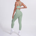 Fashion cross-border nude brushed cross back bra sports hip pocket pants fitness yoga clothes two-piece set