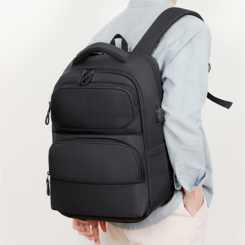 Cross-border business backpack men's leisure travel backpack commuting large capacity USB charging point computer bag wholesale