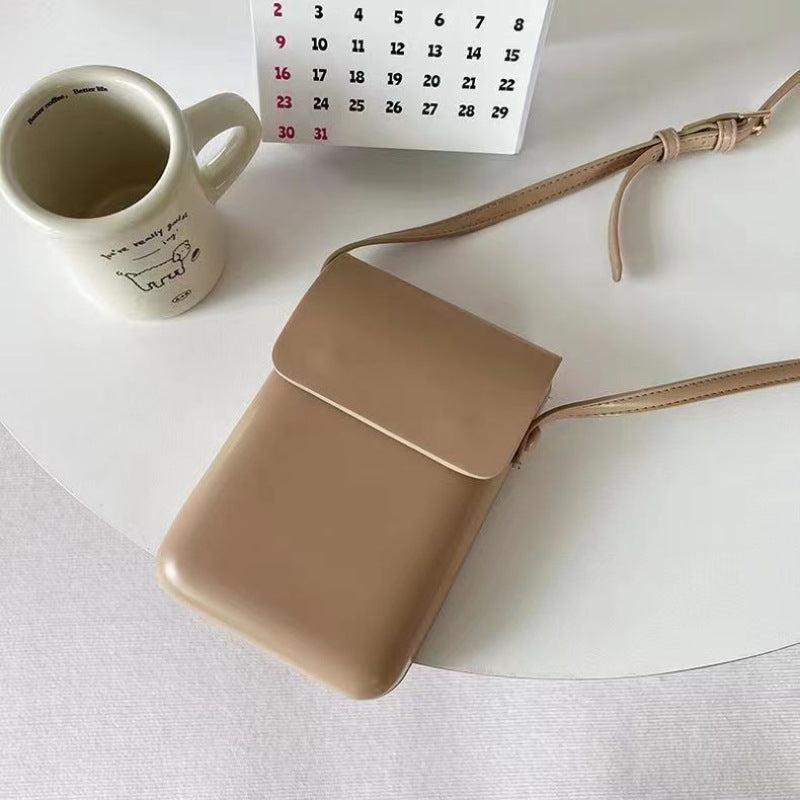 Cross-border diagonal span vertical mobile phone bag, simple and fashionable pressure shell bag, niche solid color change bag, retro texture messenger bag.
