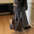 2025 new autumn/winter designer leather belt handbag - large capacity, versatile fashion backpack, shoulder bag, and crossbody bag