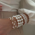 Pearl stacked bracelet set wholesale - cross-border bridal wedding light luxury high-end multi-layer adjustable stretch bracelet
