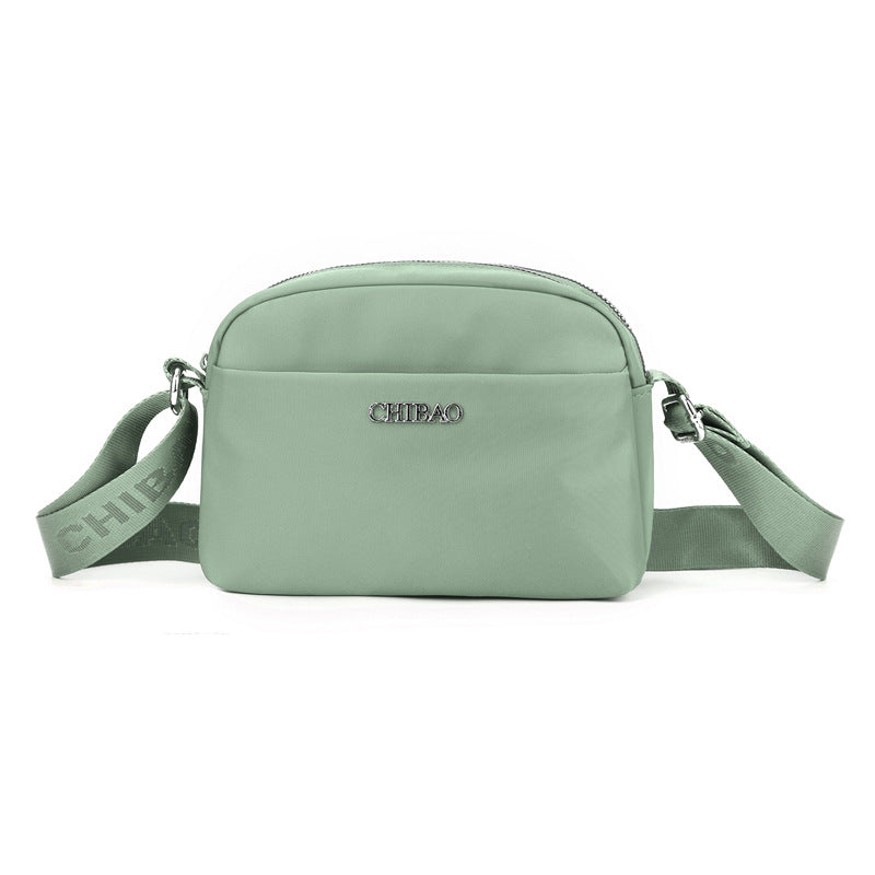 Foreign trade new lightweight messenger bag bag women's solid color simple nylon cloth casual shoulder bag portable commuter small square bag