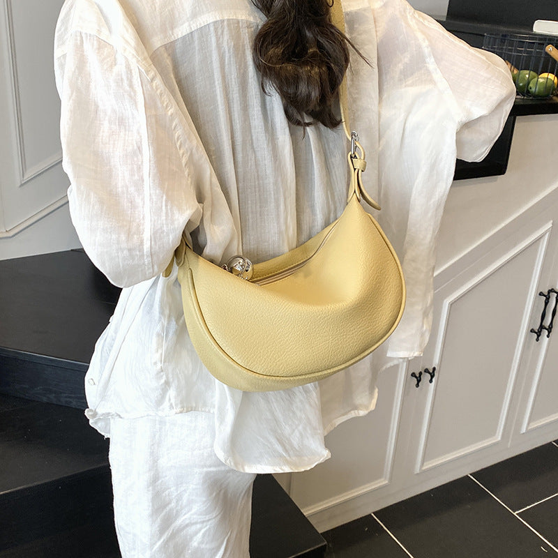 Cross-border niche soft leather lychee pattern portable dumpling bag women's 2025 new high-end fashion shoulder messenger bag