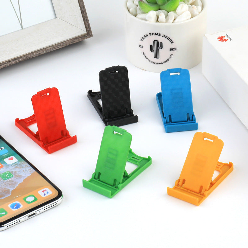 Plastic desktop folding mini mobile phone holder, multi-file desktop foldable lazy tablet holder wholesale